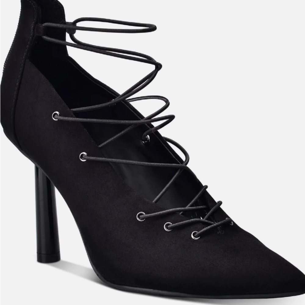Wild pair black zip up lace up heels